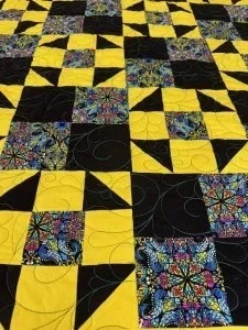 black and yellow checked squares and black triangles