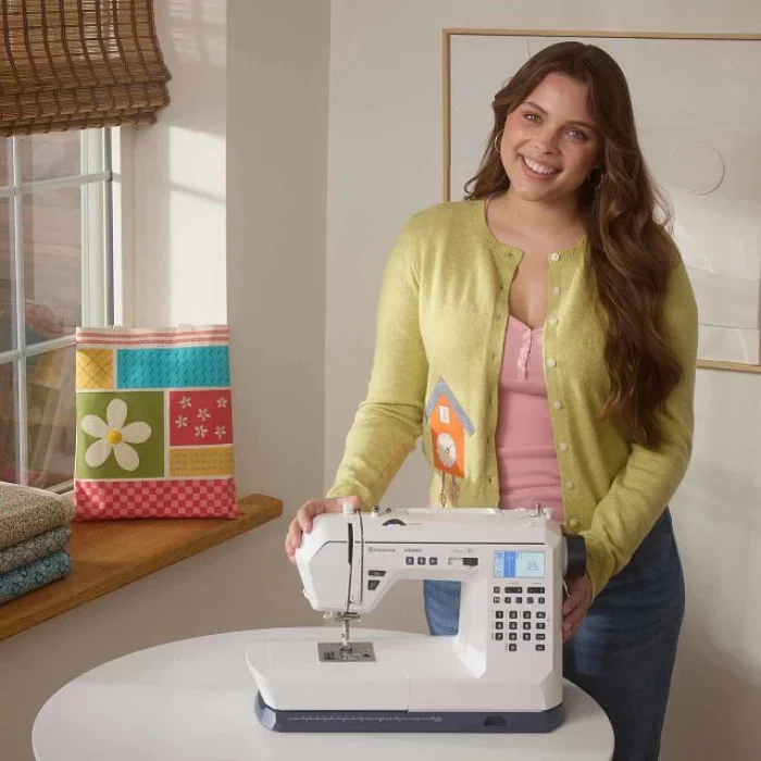 A woman standing with the Onyx 30.