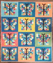 bright spring colors in pieced butterfly quilt blocks