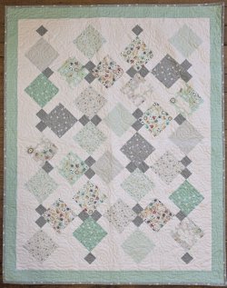 baby quilt using Dream Drifters fabric collection in a GE Designs pattern called Tara, from the Stripology Mixology 3 book