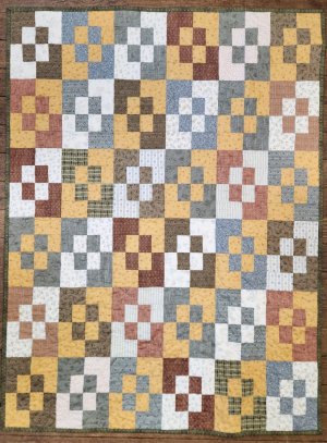 Simply Charming by Janet Nesbitt for Henry Glass Fabrics usiing Strip Down pattern by GE Designs