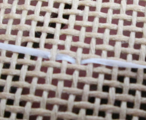 repair a cut needlepoint canvas