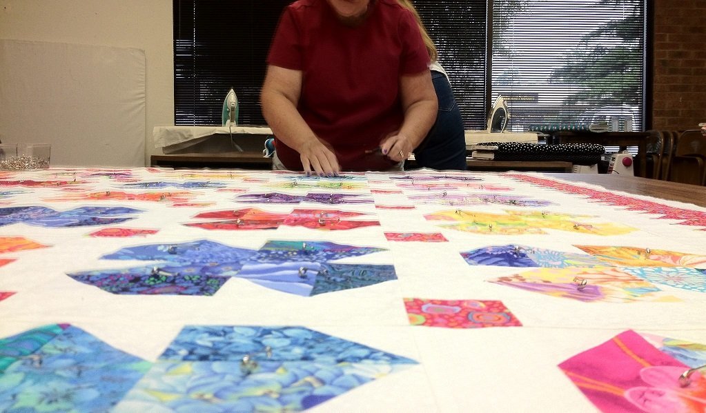 Quilt sandwiching service
