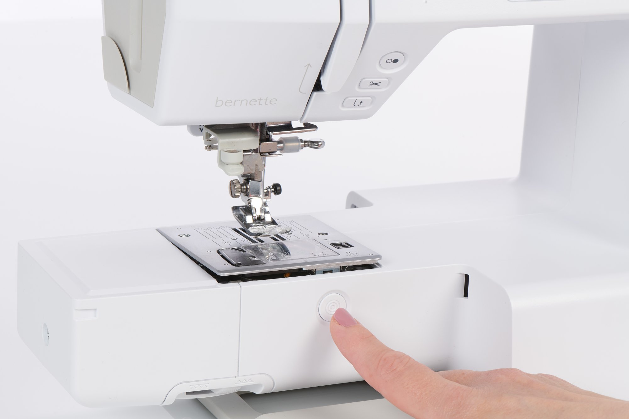 Click and Lift stitch plate with push button on the bernette B59