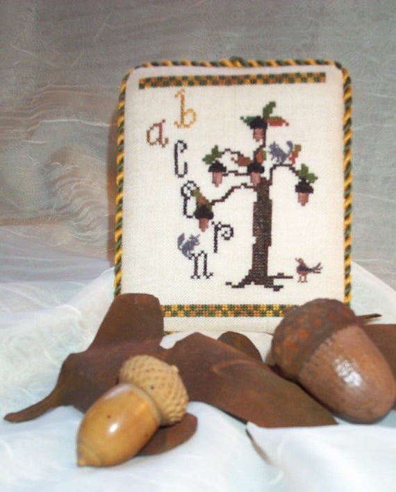 A is for Acorn designed by Dames of the Needle