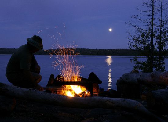 Campfire next to river