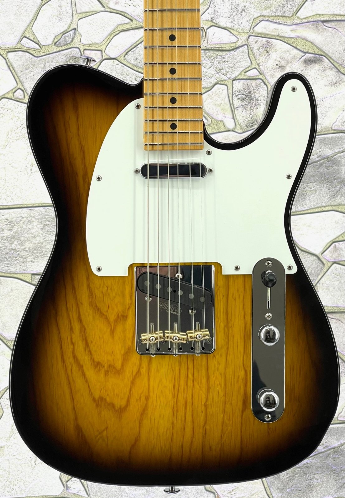 Suhr Classic T in 2 Tone Tobacco Burst with a Swamp Ash Body Maple Neck and  SS & SSCI Pickups Including a Hard Case