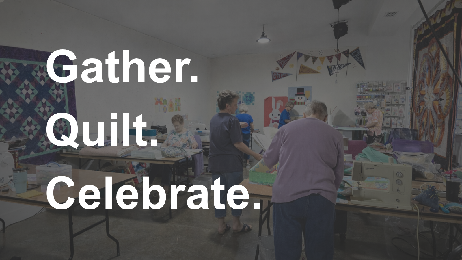 Quilters working at individual stations during a private quilting retreat in Texas with plenty of space for cutting and sewing