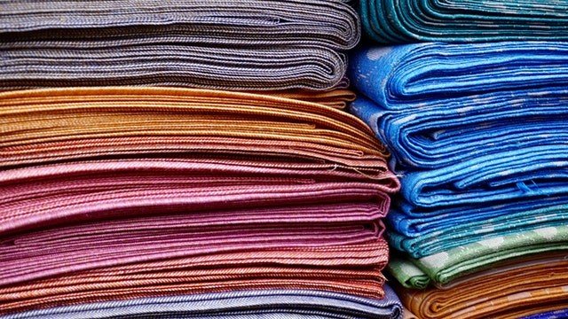 stack of folded fabrics