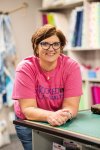 Julie, Shop Owner